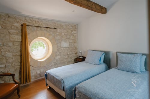 Chambre avec deux lits simples dans le Gîte Rive Droite