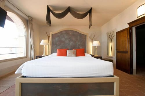 Luxury Junior Suite at Hotel San Giovanni Resort in Saluzzo with mountain view, elegant bed, and modern amenities