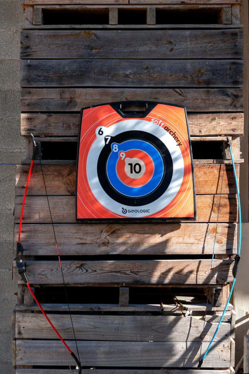 Soft cricket target game mounted on wooden wall at Mas St André bed and breakfast in Saint-Andiol, France