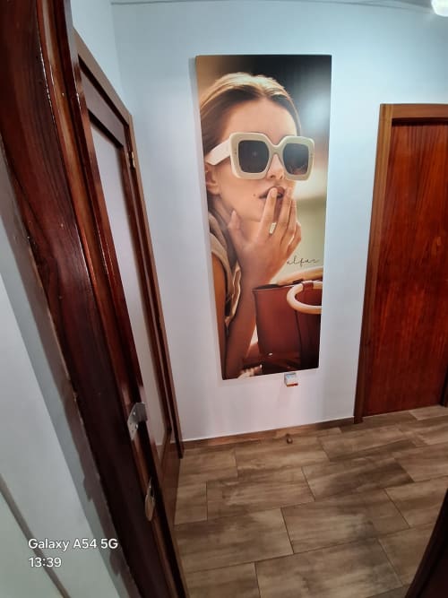Fashion portrait poster in Benavente hotel hallway with wooden doors and tiled floor