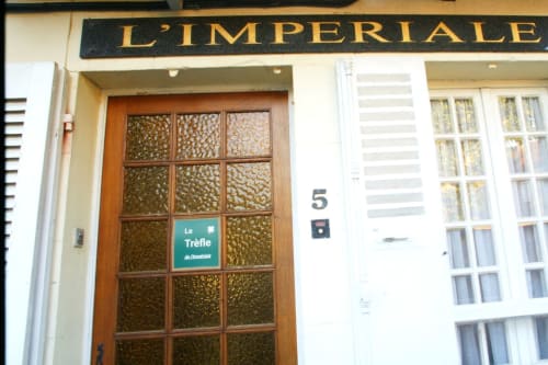 L'Impériale entrance door with Le Trèfle room sign in Sermizelles, France bed and breakfast