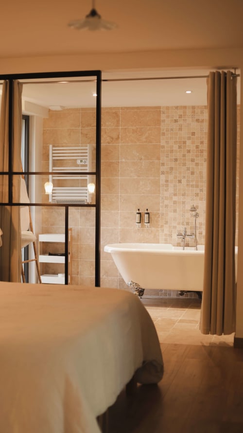 Modern bathroom with bathtub in a private-spa lodge, Épinal Vosges