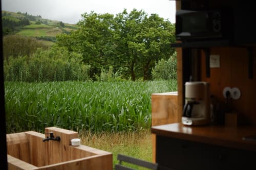 Villa Várzea rural garden view with cornfields and hillside landscape in Várzea, Portugal