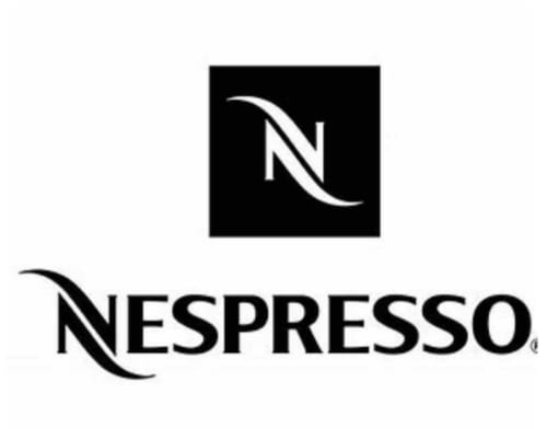 Nespresso logo - premium coffee service available at La Conciergerie De Franck cottage in Boissieres