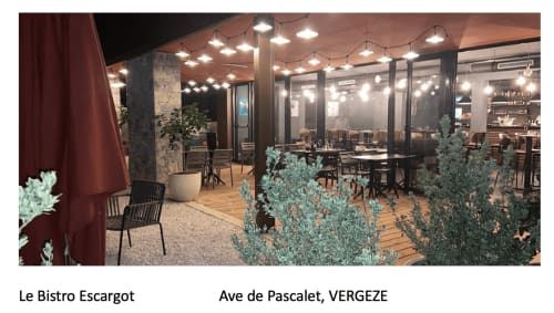 Le Bistro Escargot outdoor terrace with string lights, plants, and dining seating at La Conciergerie De Franck in Vergèze