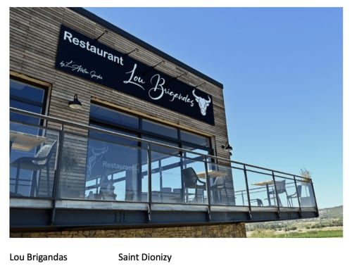 Lou Brigandas Restaurant exterior in Saint Dionizy near Boissieres with terrace and mountain views