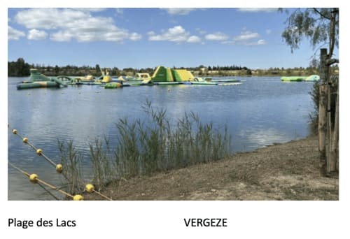 Plage des Lacs water park with inflatable attractions in Vergèze, near La Conciergerie De Franck in Boissières