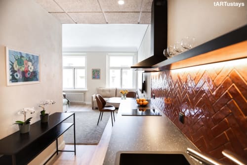 Spacious open-plan layout with multiple beds & sofa. Kairo's artistic Tartu apartment for families & groups. Near Raekoja Square, RIMI & MyFitness
