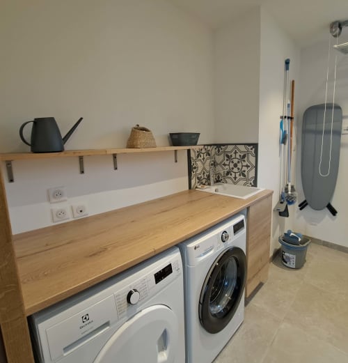 Die Waschküche, um Ihnen das Leben während Ihres Urlaubs in La Mini Moussette du Clos Delamare in der Normandie zu erleichtern.