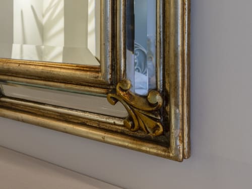 Ornate gold-framed mirror detail in Milano boutique hotel room