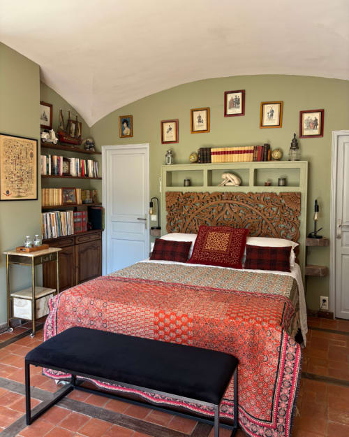 Adrien's room at Domaine Du Commandeur, Mondragon - elegant bedroom with green walls, ornate headboard, red bedding, and