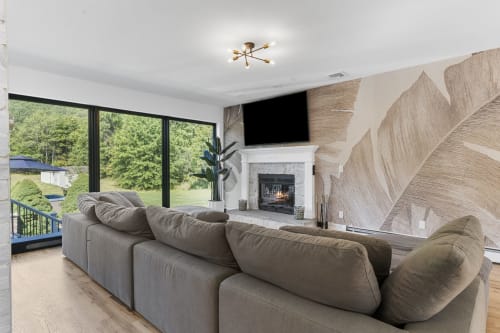 Spacious living room with natural textures – Malkita Terra