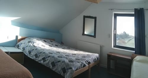 Room 2 at Au Coeur des Champs B&B in Regniowez with single bed, garden view window, and modern amenities