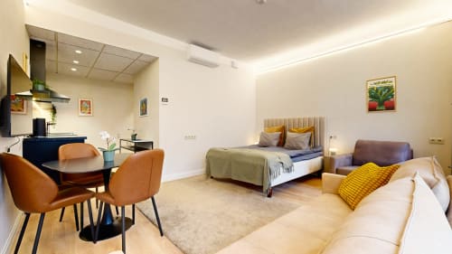 Spacious apartment with vibrant street art by Kairo. Sleeps up to 5 guests in Tartu city center. Queen & sofa beds, near Raekoja Square, RIMI & MyFitness next door. WiFi & AC