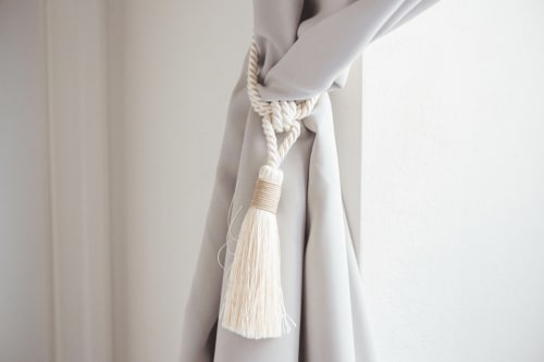 Cream curtain with beige tassel tieback at Alessia's Place suite in Como, Italy