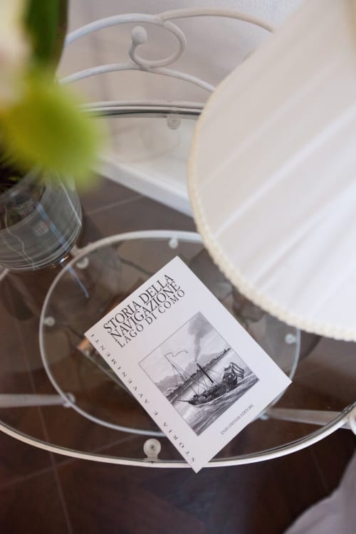 Welcome gift book and tableware at Alessia's Place Suite 4 in Como, Italy