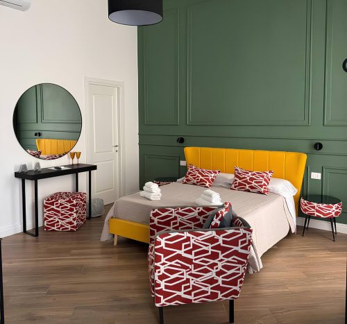 San Gennaro room with green boiserie and coordinated handcrafted textiles