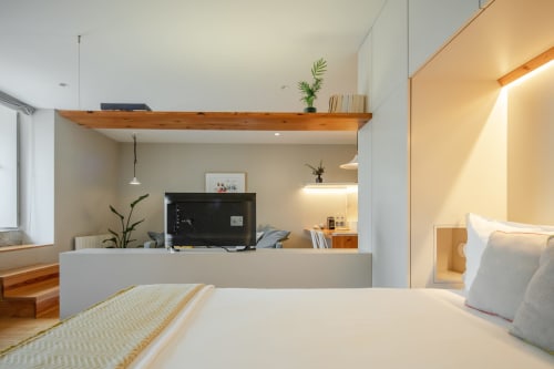 Apartamento de conceito aberto na Baumhaus Serviced Living no Porto.