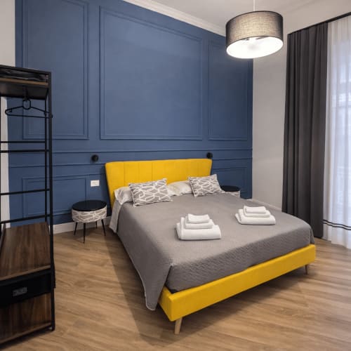 Parthenope double room with custom-made furnishings at La Boutique del Centro