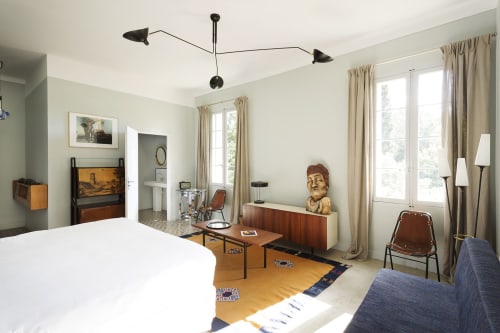 Spacious Superior bedroom at Mas De Lafeuillade Montpellier with garden views, modern furnishings, and natural light