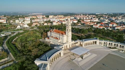 Aerial view of Sanctuary of Fátima basilica in Ourém, Portugal with surrounding cityscape