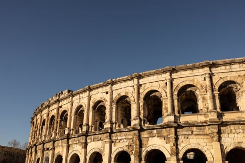 Ancient Roman amphitheater ruins in Nîmes, near Le Prieuré Notre-Dame B&B in Montfrin, France