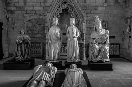 Medieval stone statues in Gothic chapel at Le Prieuré Notre-Dame, Montfrin France