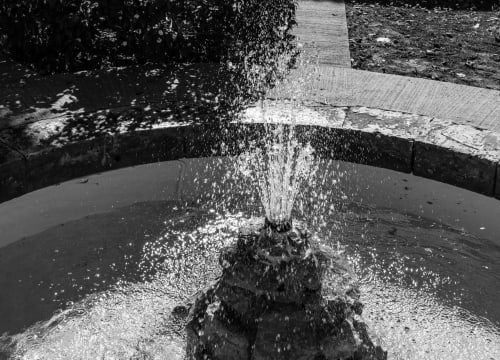 Water fountain at Le Prieuré Notre-Dame B&B in Montfrin, France