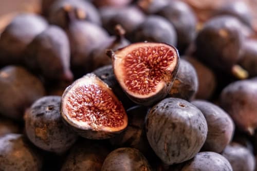 Fresh figs cut in half showing red interior at Le Prieuré Notre-Dame B&B in Montfrin, France