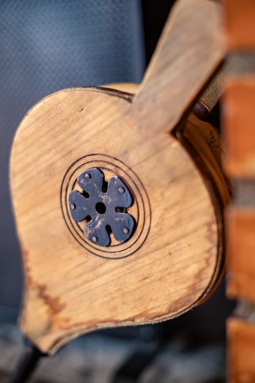 Acoustic guitar soundhole with decorative rosette at Finca Navalpino, rustic Spanish bed and breakfast in Guadamur