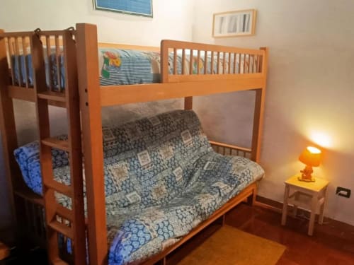 Bunk bed room with futon