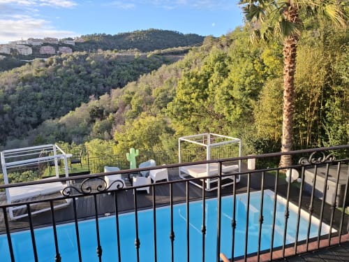 Villa Colina terrace with pool overlooking Mediterranean forest in Mandelieu la Napoule, France