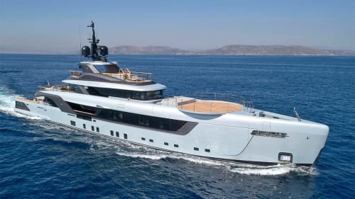 Luxury yacht anchored in turquoise Mediterranean waters near Saint Florent, Corsica