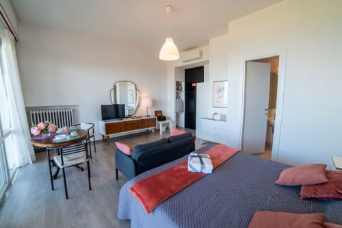 Peonia room at Belvedere del Lago with double bed, lake view, and modern furnishings in Montefiascone