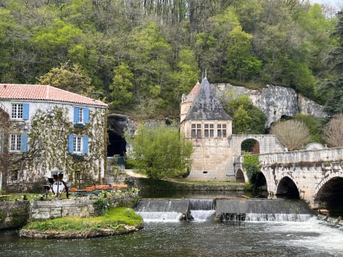 Domaine le Manoir stone manor with blue shutters, mill, bridge and waterfall in Fossemagne
