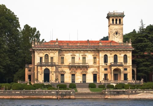 Historic waterfront villa in Como, Italy with neoclassical architecture and tower