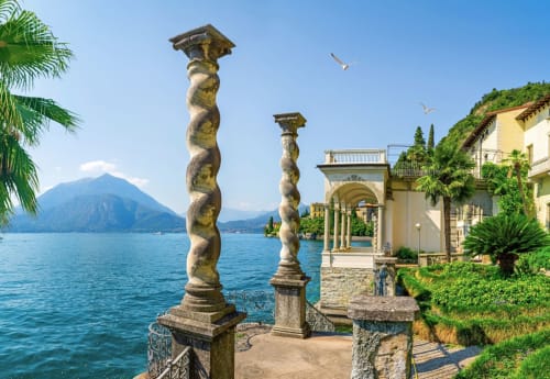 Ornate columns overlook Lake Como with mountain views, Haven Spa Luxury Loft villa terrace, Como Italy