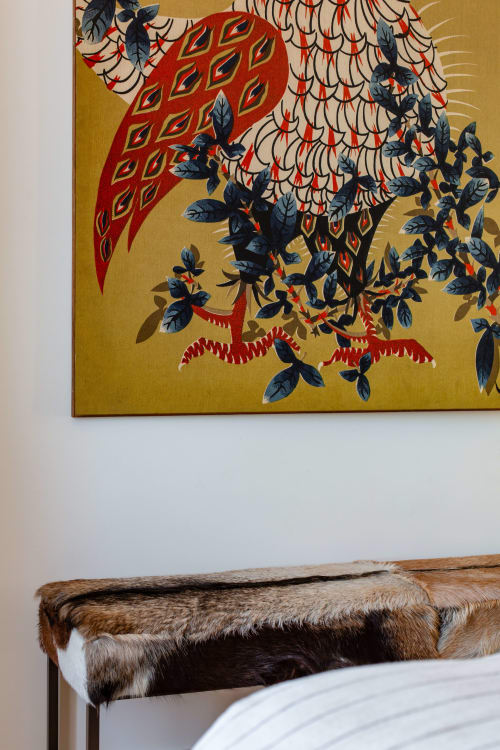 Vintage botanical artwork with red flowers above a cowhide bench at Villa Figue Blanche, Montagny-les-buxy