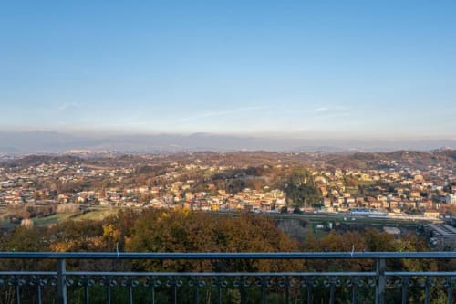 Panoramic view from Torre dei Venti balcony overlooking Ceccano cityscape with mountains and forests