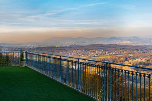 Mistral Room balcony at Torre dei Venti in Ceccano with panoramic mountain and city views over Italian countryside