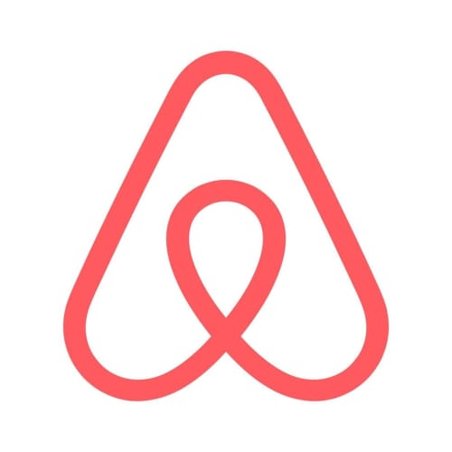 Airbnb logo icon in coral red color