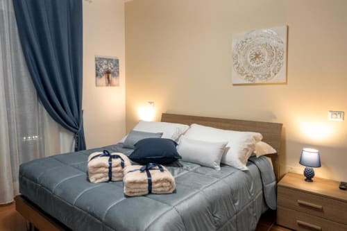 Mistral Room at Torre dei Venti B&B in Ceccano with queen bed, warm lighting, garden view, and modern amenities
