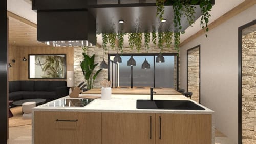 Cuisine moderne avec mobilier en bois et îlot central à la villa Les Villas de Jade à Saint-Brevin les Pins