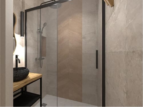 Salle de bain moderne à la Villa Acacia aux Villas de Jade avec douche vitrée, vasque noire et carrelage neutre