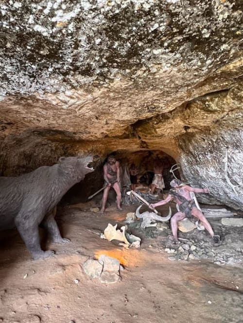 Prehistoric scene in a rock shelter in the Dordogne