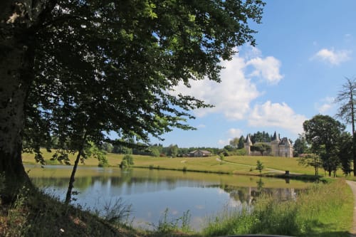 Château view from Domaine de Bort with pond and green grounds, Saint-Priest-Taurion Limoges