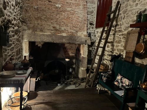Historic stone kitchen with fireplace at Quinta das Pias, Portugal bed and breakfast accommodation