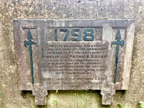 Historic stone plaque from 1798 at Wicklow bridge commemorating brothers Phillip and Patrick Lacey
