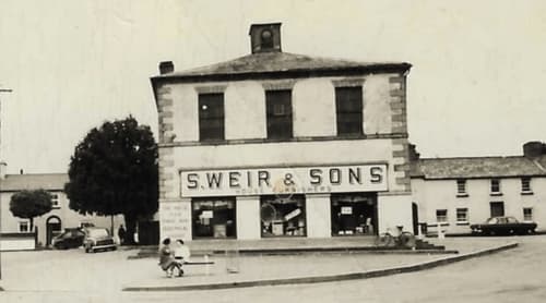 S. Weir & Sons historic building in Wicklow, Ireland - vintage storefront with character facade