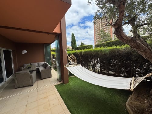 Terraço do apartamento Sweet Home Litoral Mar em Portimão com rede, área de estar e vista para o mar